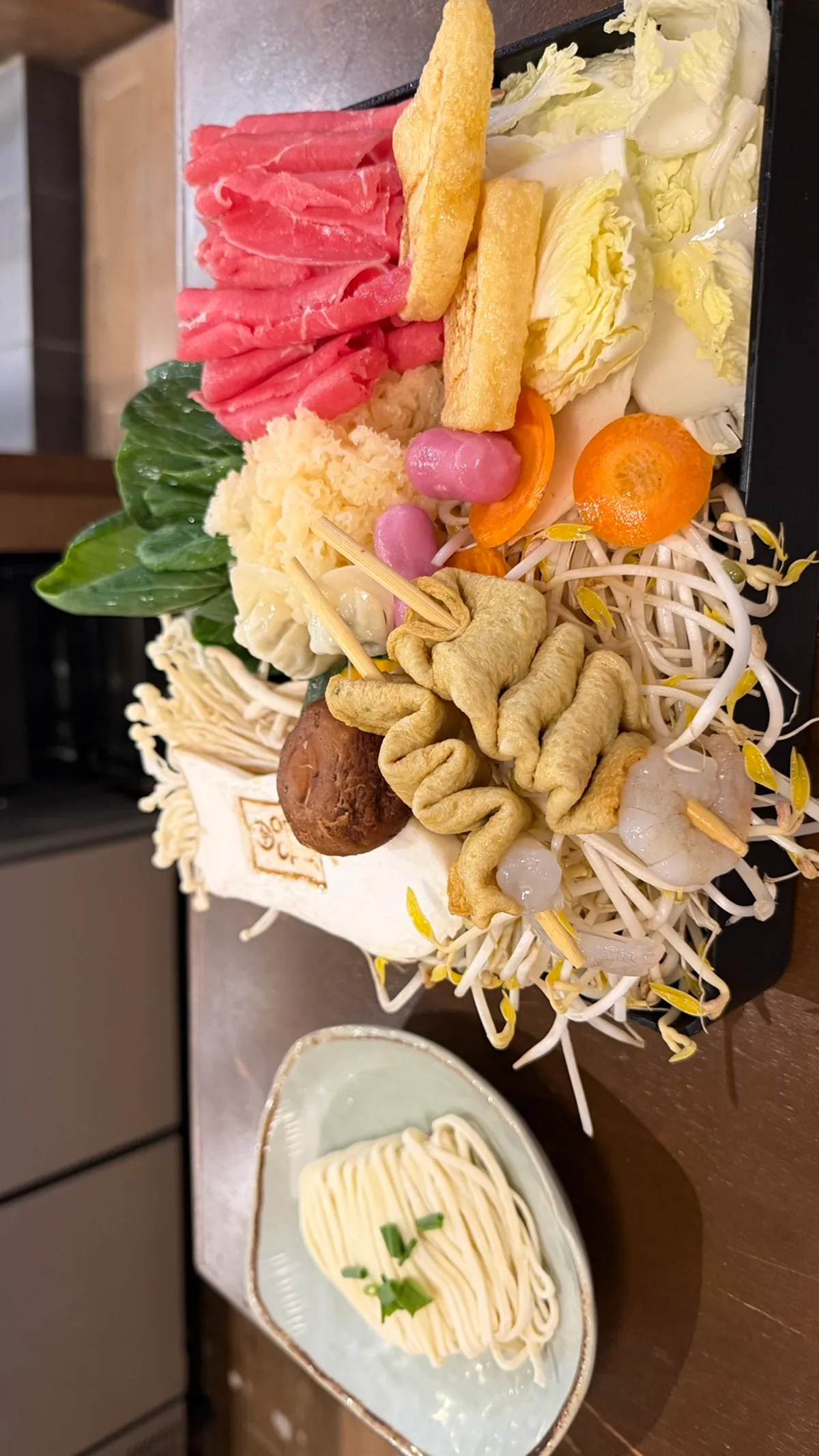The shabu-shabu broth pot set up at the table