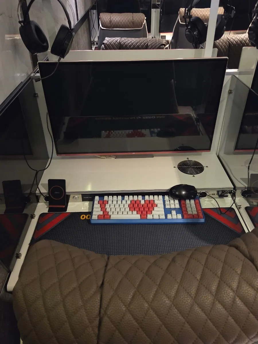 Spacious desk and gaming monitor at a seat