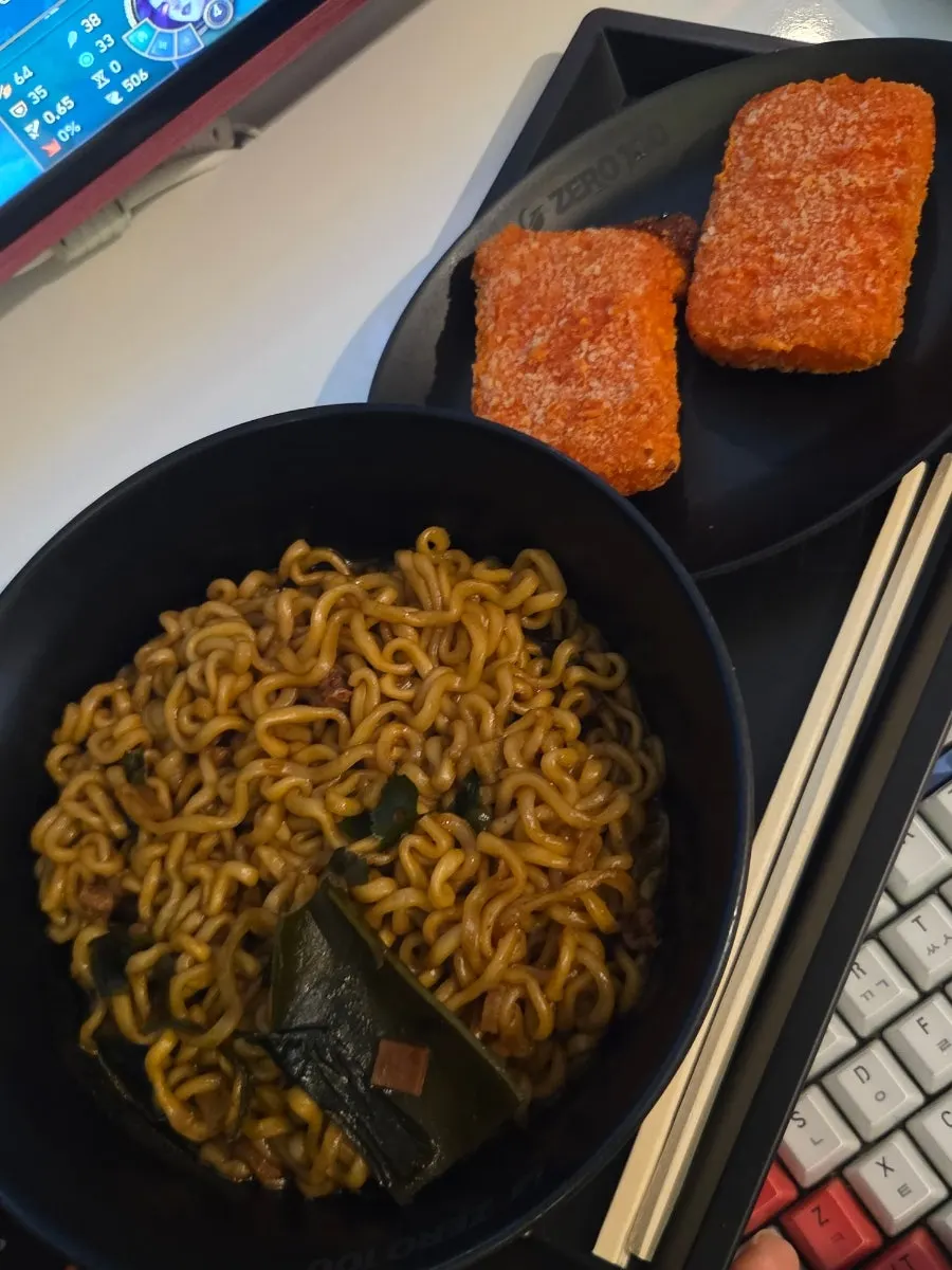 Bulgri ramyeon and cheese sticks eaten at the seat