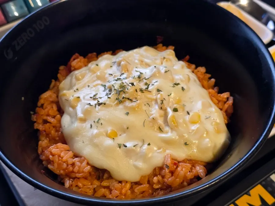 A bowl of corn mayo kimchi fried rice